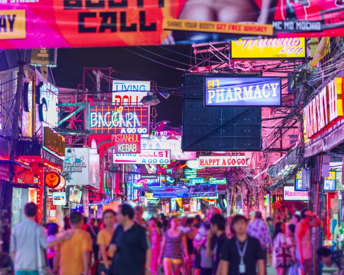 In Thailand’s sex tourism hub, bright lights flash, loud music blares – and underage girls are exploited