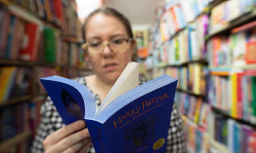 Rebecca Sharrock holding a book