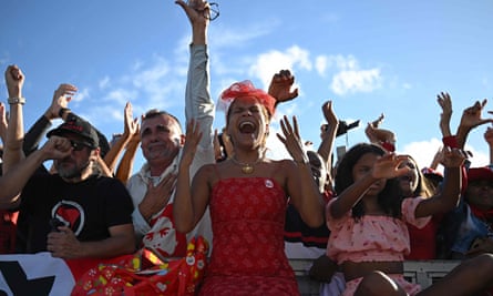 Supporters of Brazil’s new President Luiz Inácio Lula da Silva react as they gather in the surroundings of the National Congress to follow his inauguration