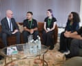 The work and pensions secretary Pat McFadden sits with staff at the John Lewis store on London’s Oxford Street for an announcement of the retail scheme.