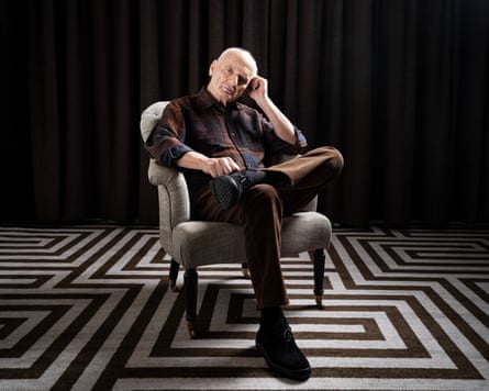 David Chase, creator of The Sopranos, sitting in an armchair.