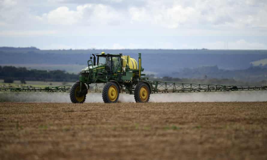 A farmer spraying a soya bean field in Goiás, Brazil this month.