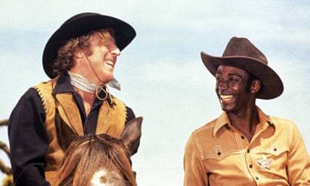 Played for laughs ... Gene Wilder and Cleavon Little in Blazing Saddles (1974).