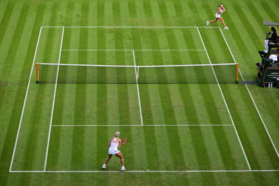 Kristina Mladenovic (top) returns the ball to Angelique Kerber.