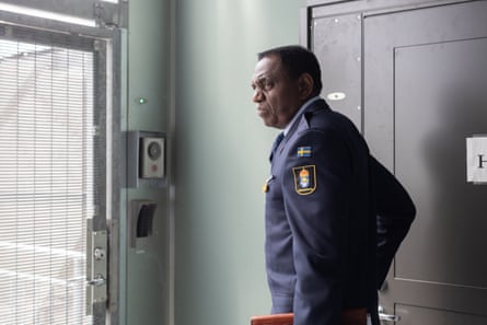 Jacques Mwepu, prison governor at Kumla, stares out of a prison window
