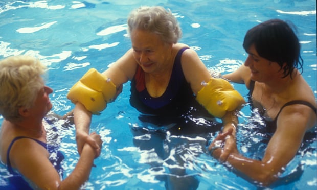 Older women learning to swim.