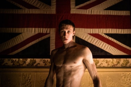Actor George MacKay against union flag in True History Of The Kelly Gang