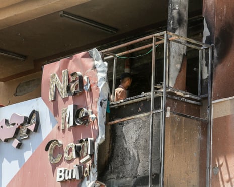 Palestinians try to reach casualties following Israeli strikes on Nasser hospital in Khan Younis.