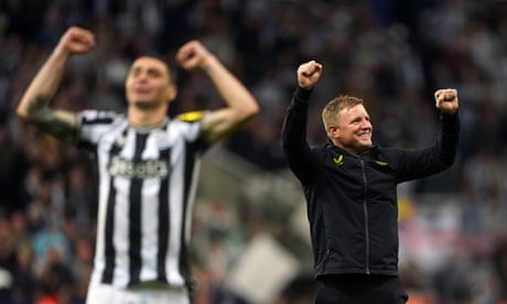 The Newcastle United manager, Eddie Howe (right), celebrates after the Champions League win against PSG.