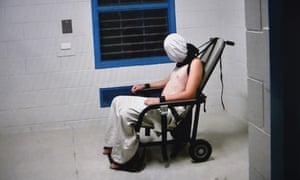 Dylan Voller hooded and strapped into a chair at Don Dale a youth detention centre in Darwin, as shown by Four Corners