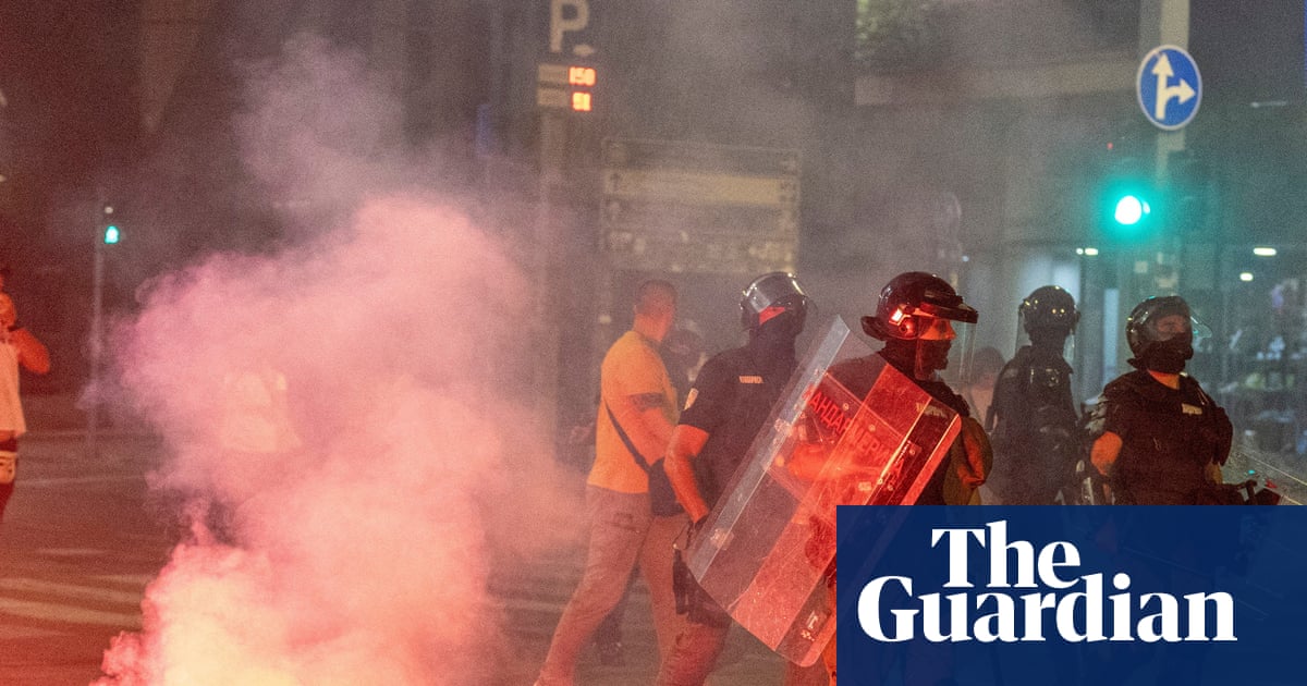 Dozens injured in Serbia as protesters clash with pro-government supporters