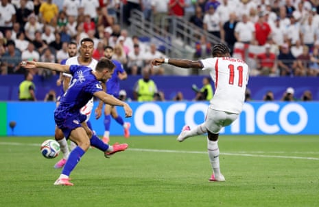 Marcus Rashford #11 of England scores his team's fourth goal