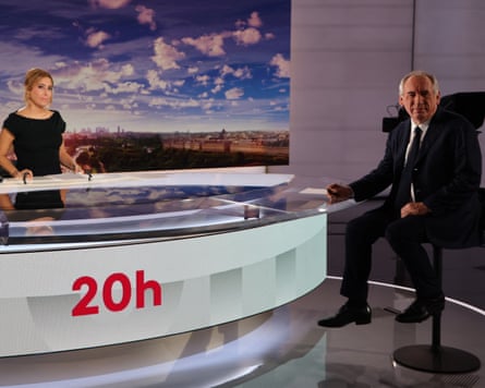 Francois Bayrou poses on the TV set prior to an interview with French journalist Lea Salame on 4 September.