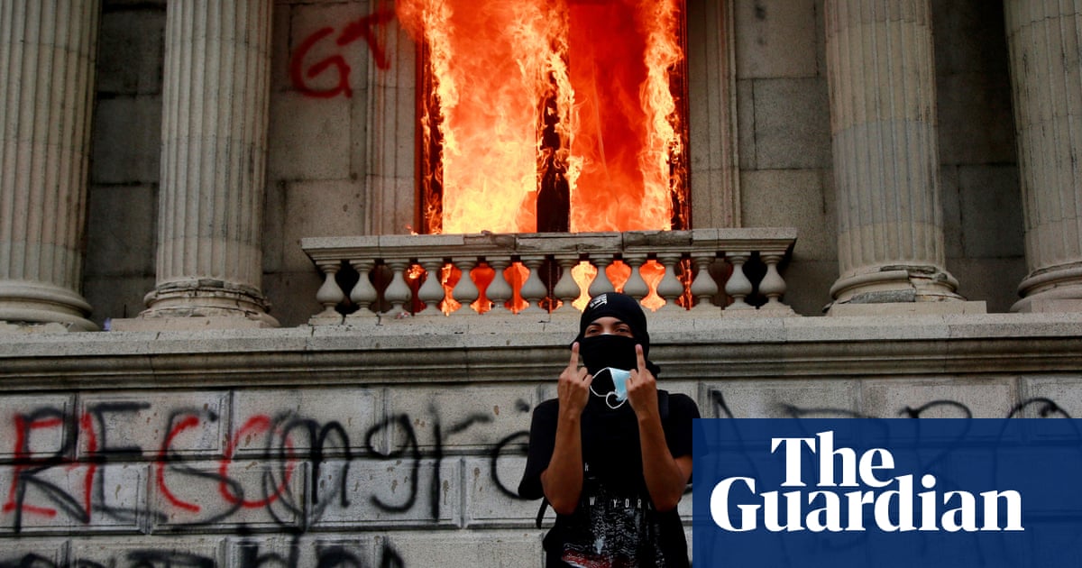 Guatemala protesters set congress on fire during budget protests - The Guardian