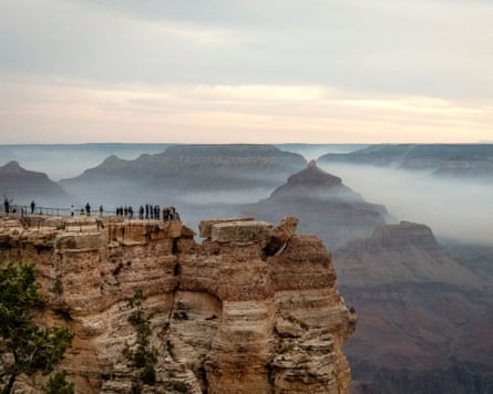 Smoke from the Dragon Bravo fire is seen from the busier South Rim of Grand Canyon in Arizona.