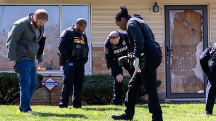 Investigators examine the scene outside the home of Indianapolis city-county councilor Ron Gibson on 6 April, 2026.