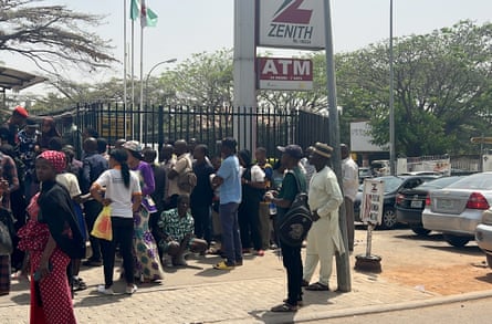 Long queues outside a bank in Abuja, Nigeria.