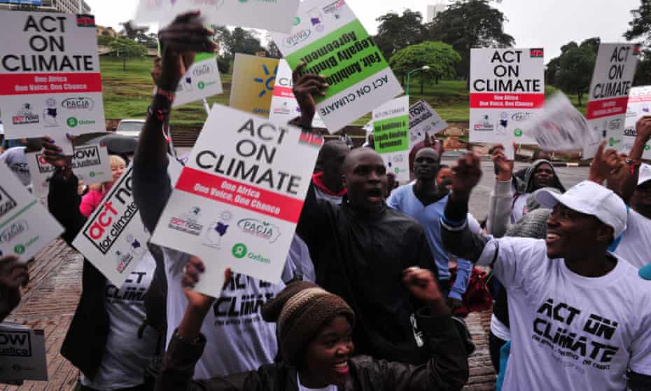 People take part in demonstration calling for climate change justice for Africa in Nairobi
