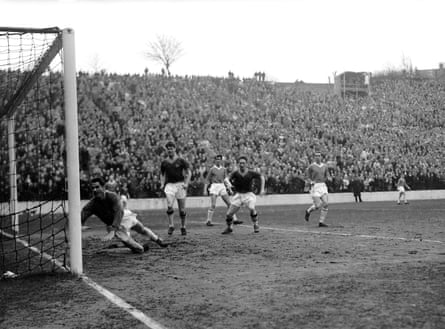 Plymouth Argyle’s Wilf Carter (fourth left) scores his team’s first goal past stand in Charlton Athletic goalkeeper John Hewie (left). Hewie, whose usual position is full back, was only between the posts due to injuries to Charlton’s two goalkeepers.