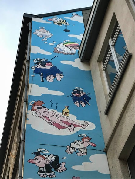 Passe moi l’ciel mural – depicting the afterlife – on the streets of Brussels
