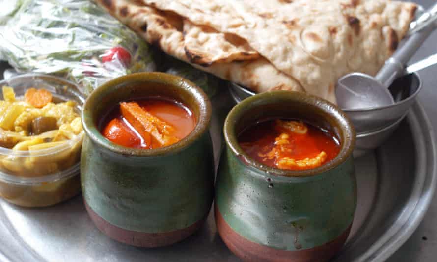 Traditional dizi stew in 2 pots with flatbread