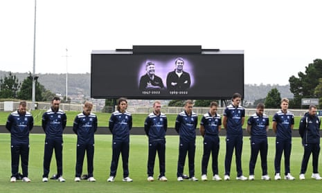 Cricketers hold a minute’s silence for the deaths of Rodney Marsh and Shane Warne on Sunday before a match between Tasmania and Victoria in Hobart.