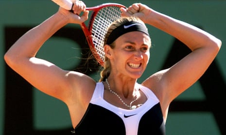 Mary Pierce celebrates after beating Martina Hingis in the semi-final on the way to winning the French Open in 2000.