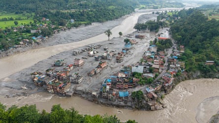 An aerial view shows houses deluged in sludge after flash floods at Devighat, Bidur Municipality in Nepal’s Nuwakot district.