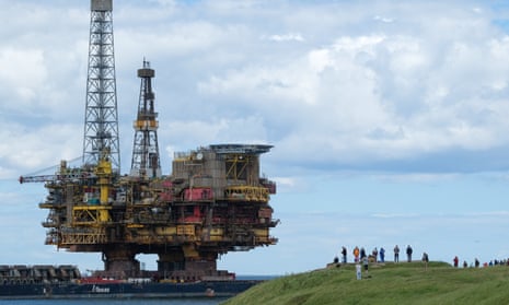The Brent Bravo oil platform is transported into the mouth of the River Tees for decommissioning in June 2019