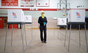 A poll worker cleans stations as Baltimore holds a special election for Maryland’s seventh congressional district on 28 April.