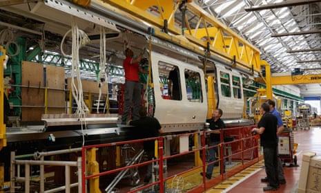 Technicians at the Bombardier Transportation plant in Derby work on new trains for London’s Crossrail project.