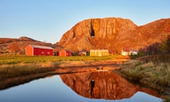 Torghatten, Torget, Bronnoy, Nordland, Norway. A granite mountain with a hole or natural tunnel through the centre<br>KX9AM1 Torghatten, Torget, Bronnoy, Nordland, Norway. A granite mountain with a hole or natural tunnel through the centre
