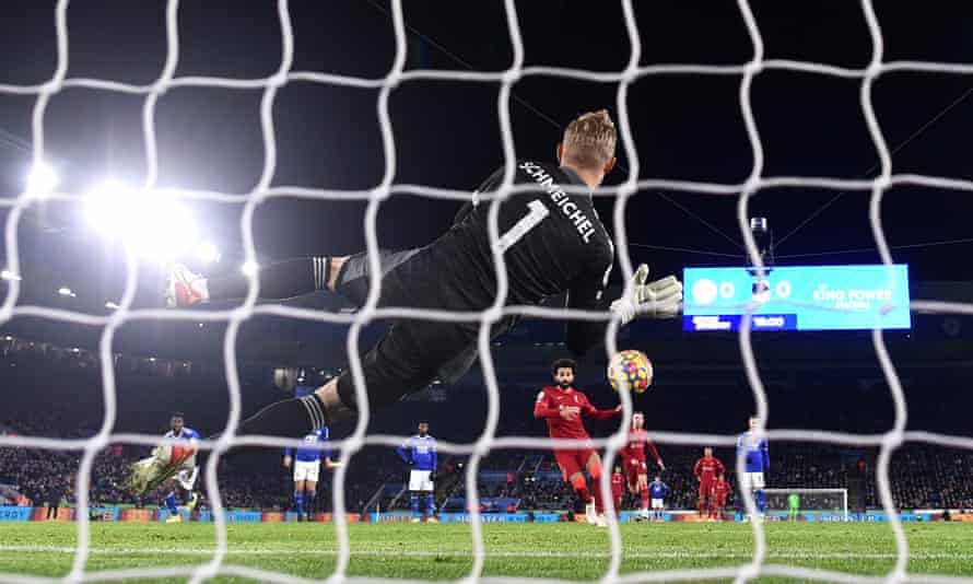Kasper Schmeichel saves Mohamed Salah’s penalty in the first half.
