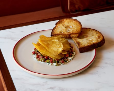 beef rump tartare with caper dressing and dripping toast.