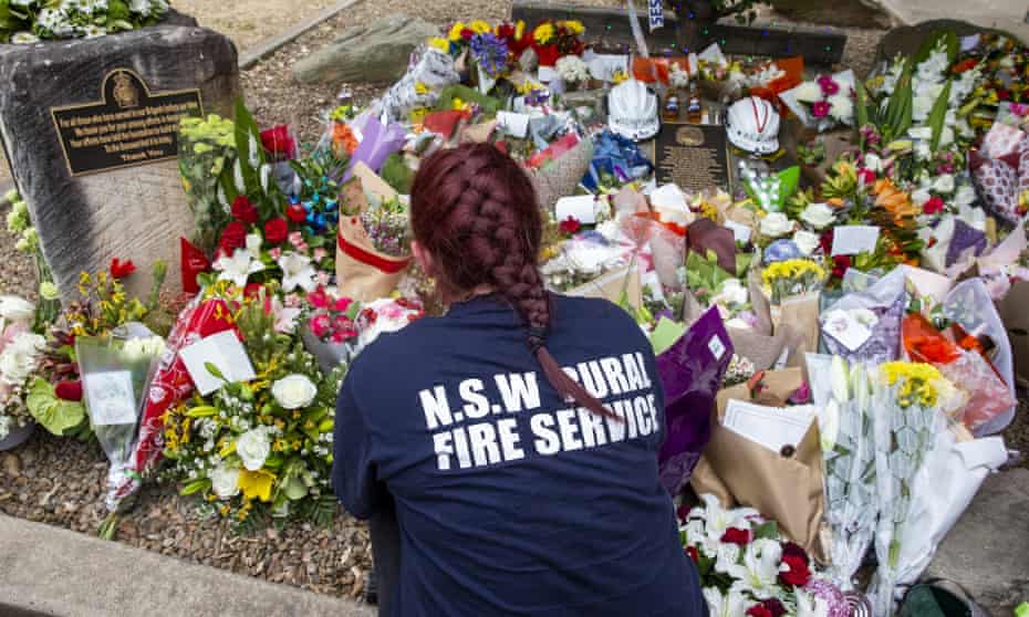 Tributes for Geoffrey Keaton and Andrew O’Dwyer are laid at Horsley Park Rural Fire Brigade