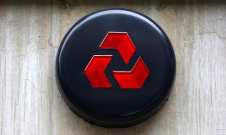 A logo is seen outside a NatWest bank branch in London