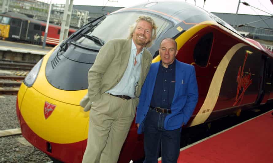 Souter, right, with Richard Branson at the launch of the high-speed Pendolino train in 2002.
