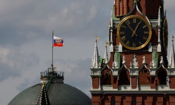 The Russian flag flies on the dome of the Kremlin Senate building in Moscow<br>The Russian flag flies on the dome of the Kremlin Senate building behind Spasskaya Tower, while the roof shows what appears to be marks from the recent drone incident, in central Moscow, Russia, May 4, 2023. REUTERS/Stringer