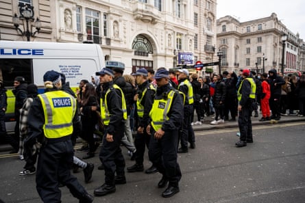 Police in attendance as rapper Digga D films a video in Piccadilly Circus.