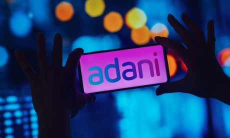 Adani Group abandons share offer as crisis triggered by fraud claims escalates