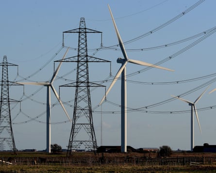 A windfarm and electricity pylons in Kent