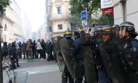 Police and protesters in Paris.