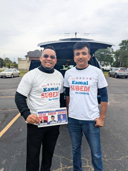 Kamal Subedi, right, with a supporter.