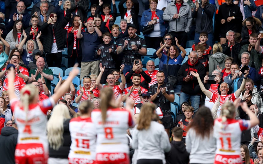 St Helens fans celebrate after beating Leeds Rhinos in the Betfred Women’s Super League Grand Final in May.