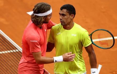 Stefanos Tsitsipas congratulates Thiago Monteiro after defeat to the Brazilian at the Madrid Open in April.