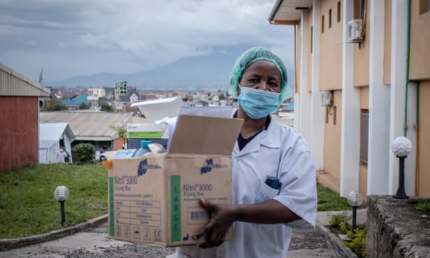 A health worker with during the xaccination campaign on May 05, 2021 in Goma, Congo. The central African country received 1.7 million doses of AstraZeneca vaccine through the UN-led COVAX facility in March. 