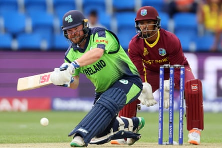 Ireland’s Paul Stirling plays a shot watched by West Indies’ wicketkeeper Nicholas Pooran during their ICC mens Twenty20 World Cup 2022 cricket match.