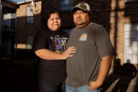 Marco Antonio Ortuño and wife Cecilia RodrÃÂguez stand close together, posing outdoors