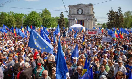 Thousands of people with placards and EU and Moldovan flags in central Chișinău.