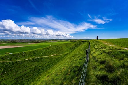 The long grassy banks of Maiden Castle, the huge iron age Dorset hill fort that inspired the novelist John Cowper Powys.
